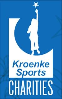Kroenke Sports Charities Logo - there is a main blue box with 3 dark blue watermarked shapes in the box, one of which looks like a star. in the middle of the box there is a white box with a blue circle cut out in the top right section. In that blue circle we see a silhouette of a person reaching for a star. At the bottom of the white box in blue text are the words Kroenke Sports. Under the white box in white text is the word Charities.